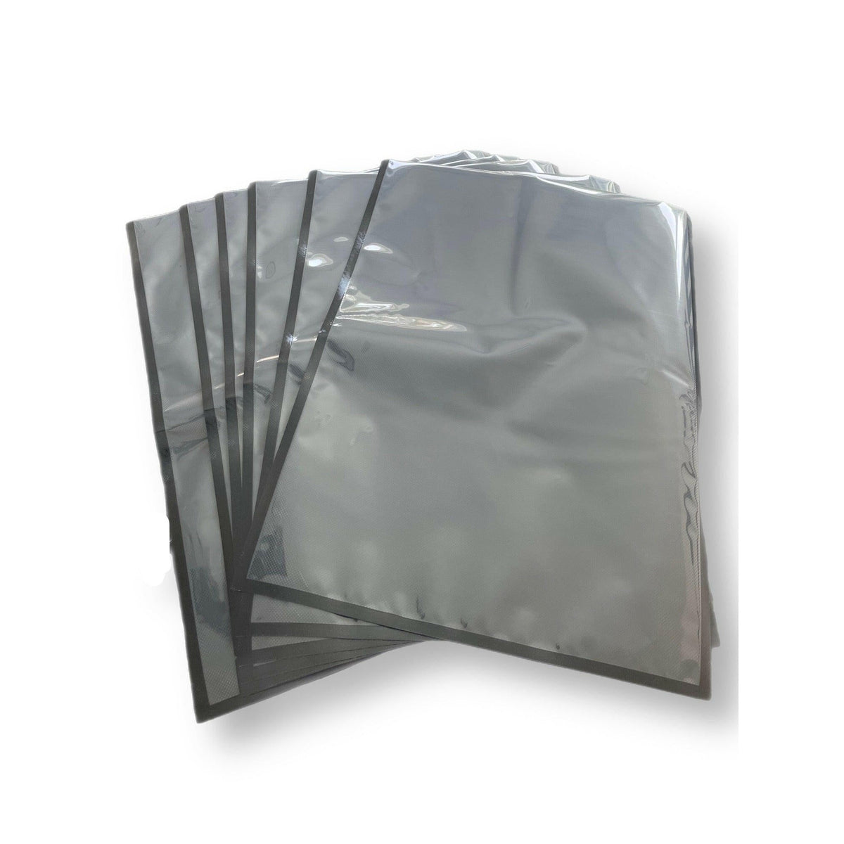 454 Bags 5 mil black/clear vacuum bags - pre-cut bags fanned out showing black and clear sides